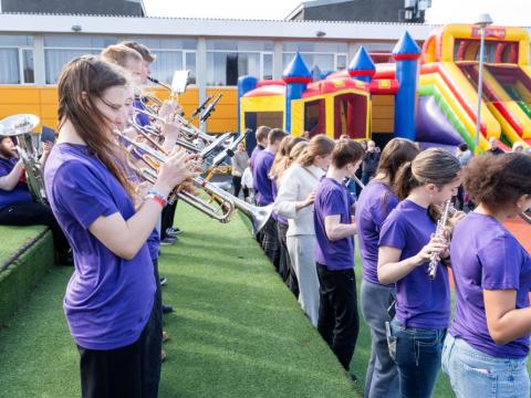 A glimpse of the brass band performing.