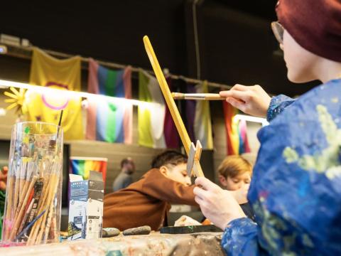 Picture of children painting and crafting.
