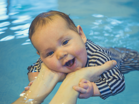 Infant in swimming pool
