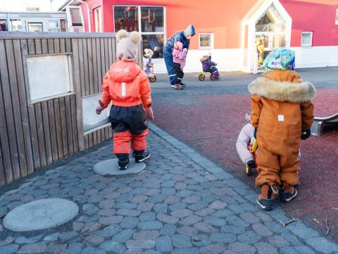 Children playing on a preschool playground.