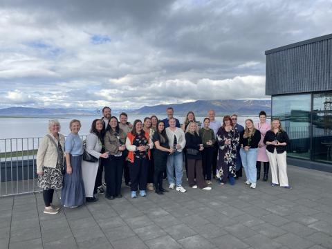 A group photo of the attendees at the reception.
