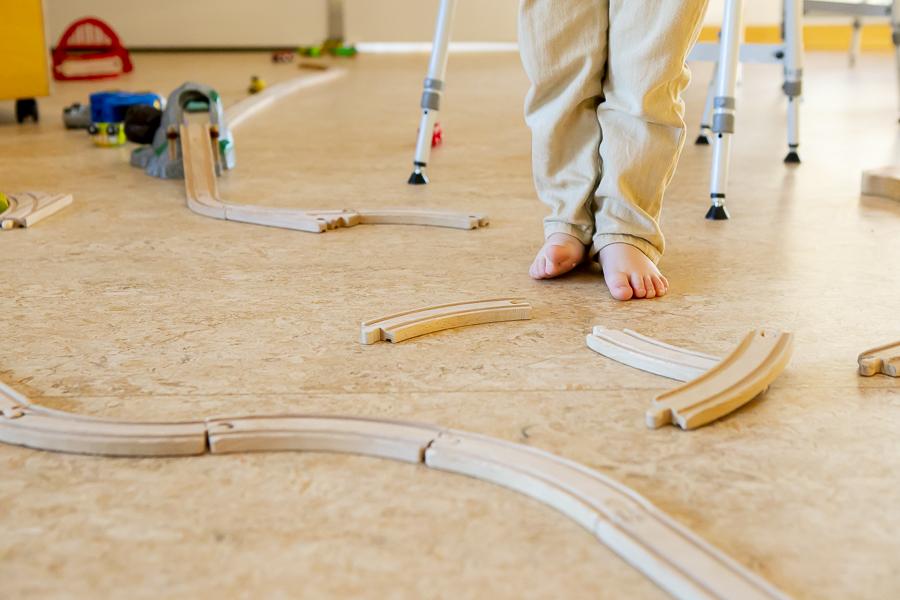A toy car track on the floor at Blásalir.