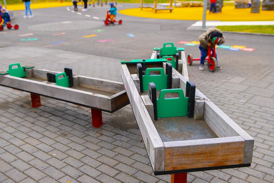 Children and playground equipment on Seljaborg's grounds.