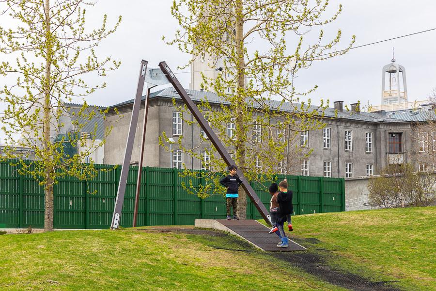 A zip line at an outdoor play area. Children at play.