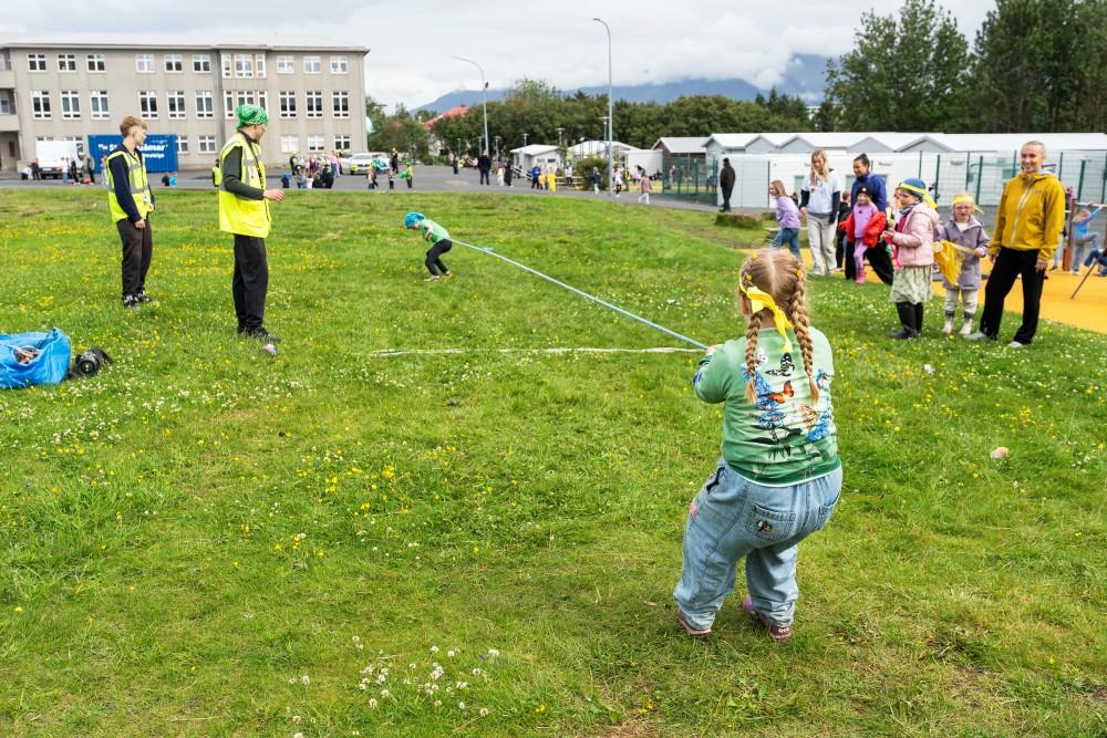 Children competing in tug-of-war