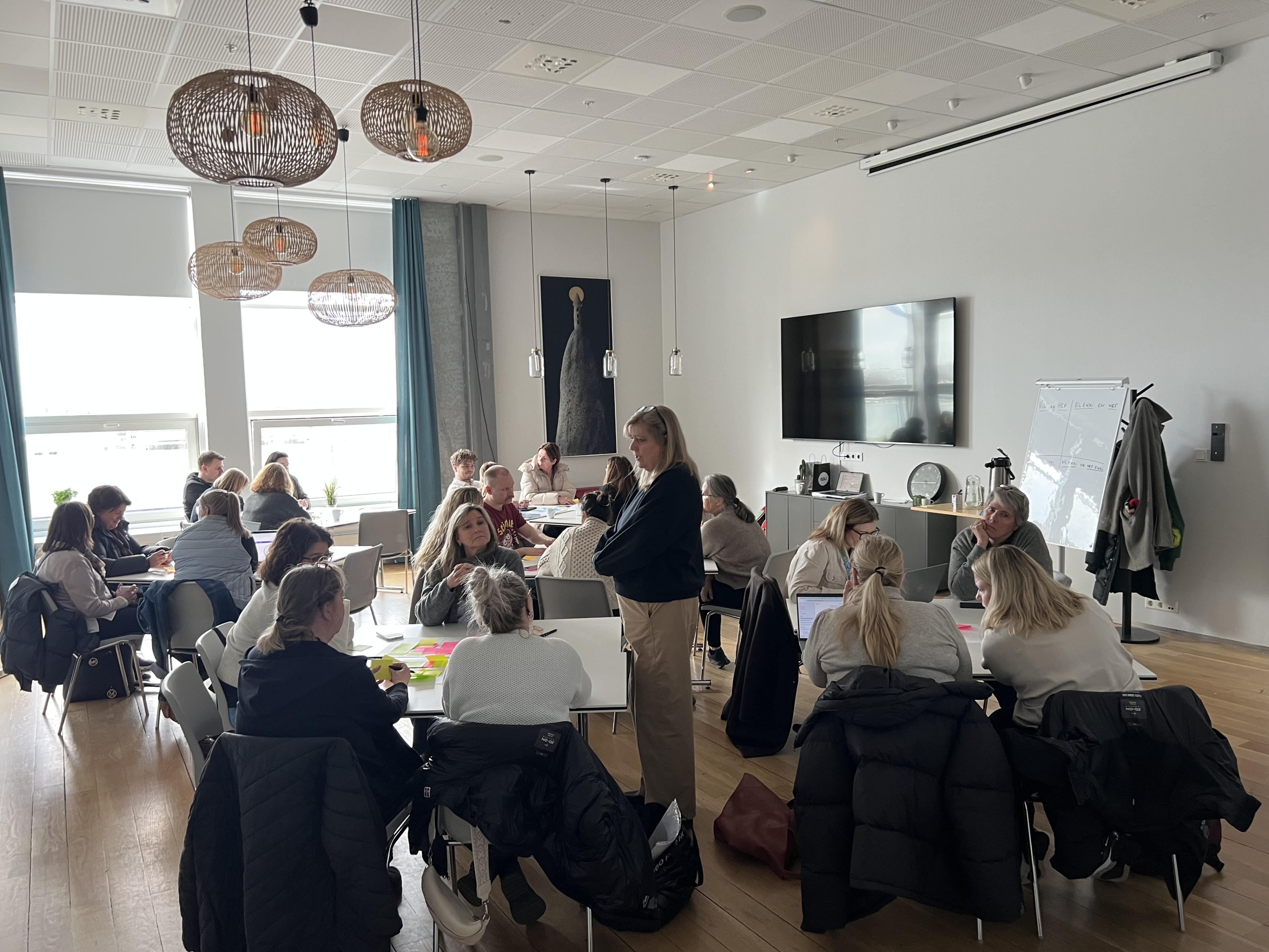 Photo of experts in discussion at a workshop