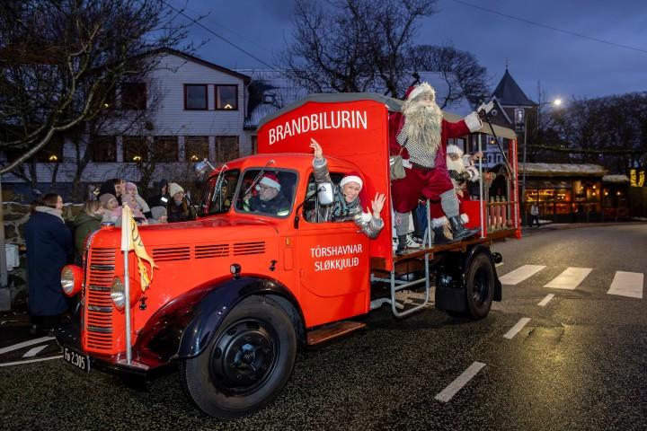 Yule Lads in a fire truck delighted passersby. 