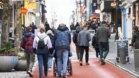 people walking on pedestrian street
